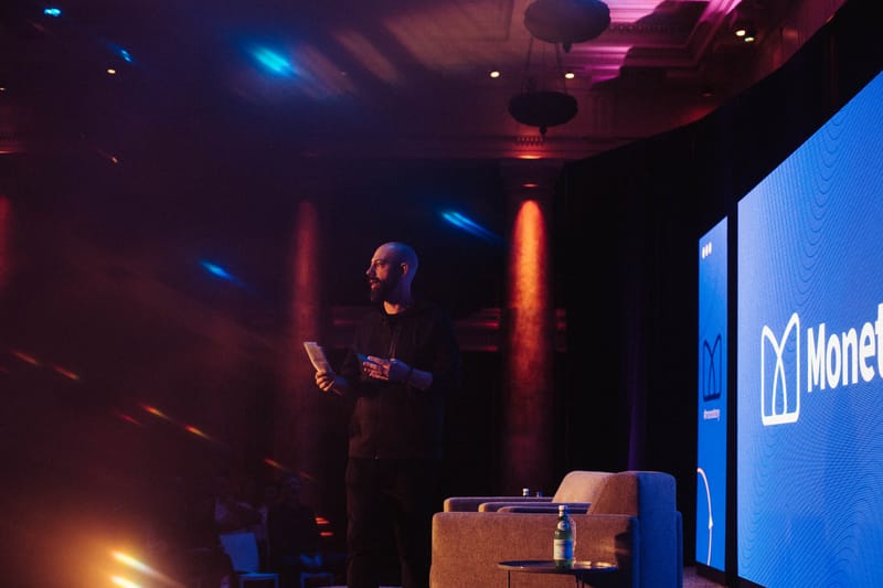 Ben Milne, founder of Dwolla and Brale, addressing attendees at Monetery Des Moines